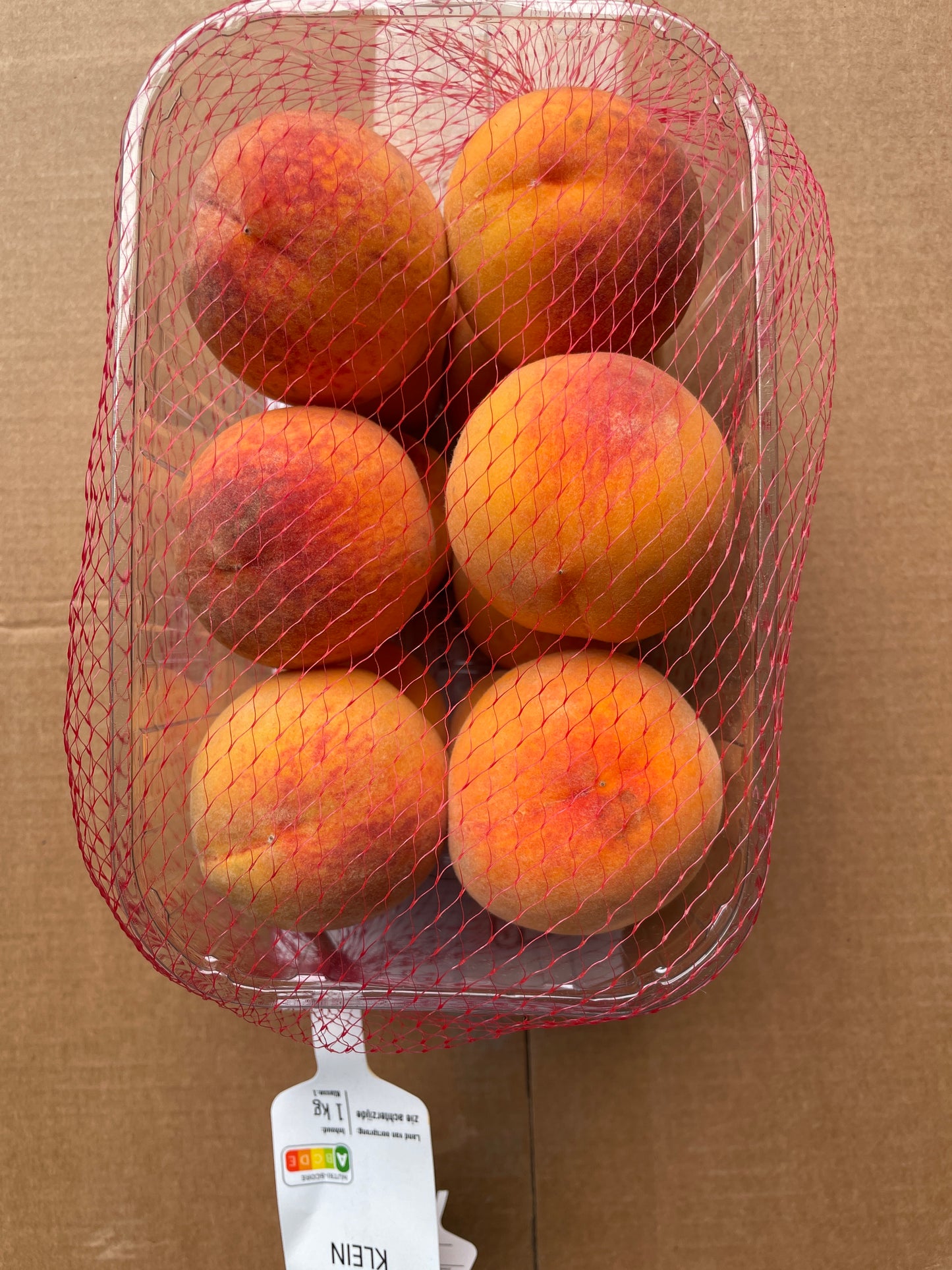 Perziken, 1kg per bakje
