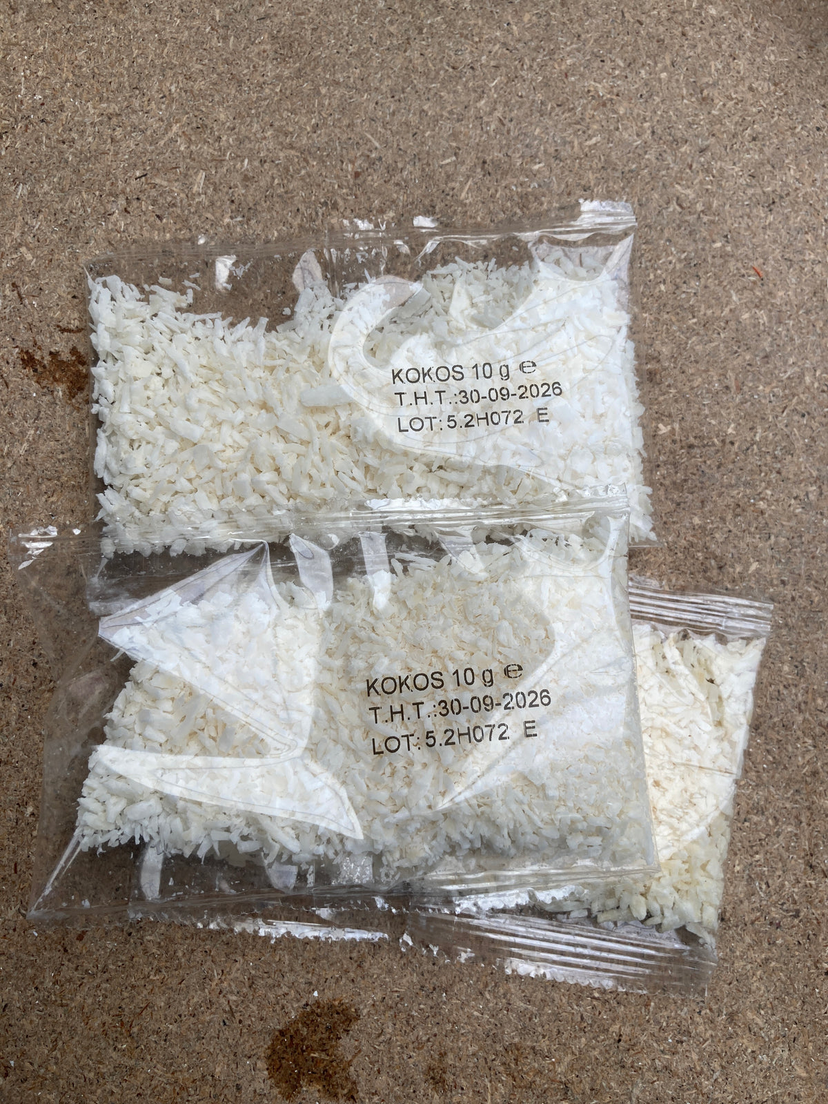 K40P05 geraspte kokos (per 10 zakjes van 10g)