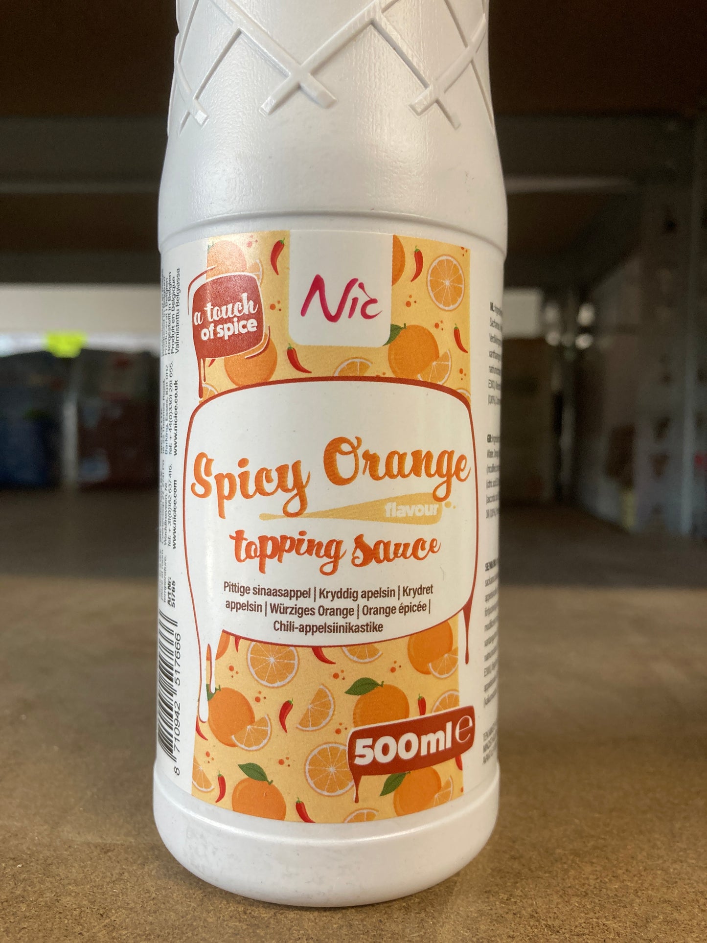 K40P05 spicy orange topping saus (per fles)