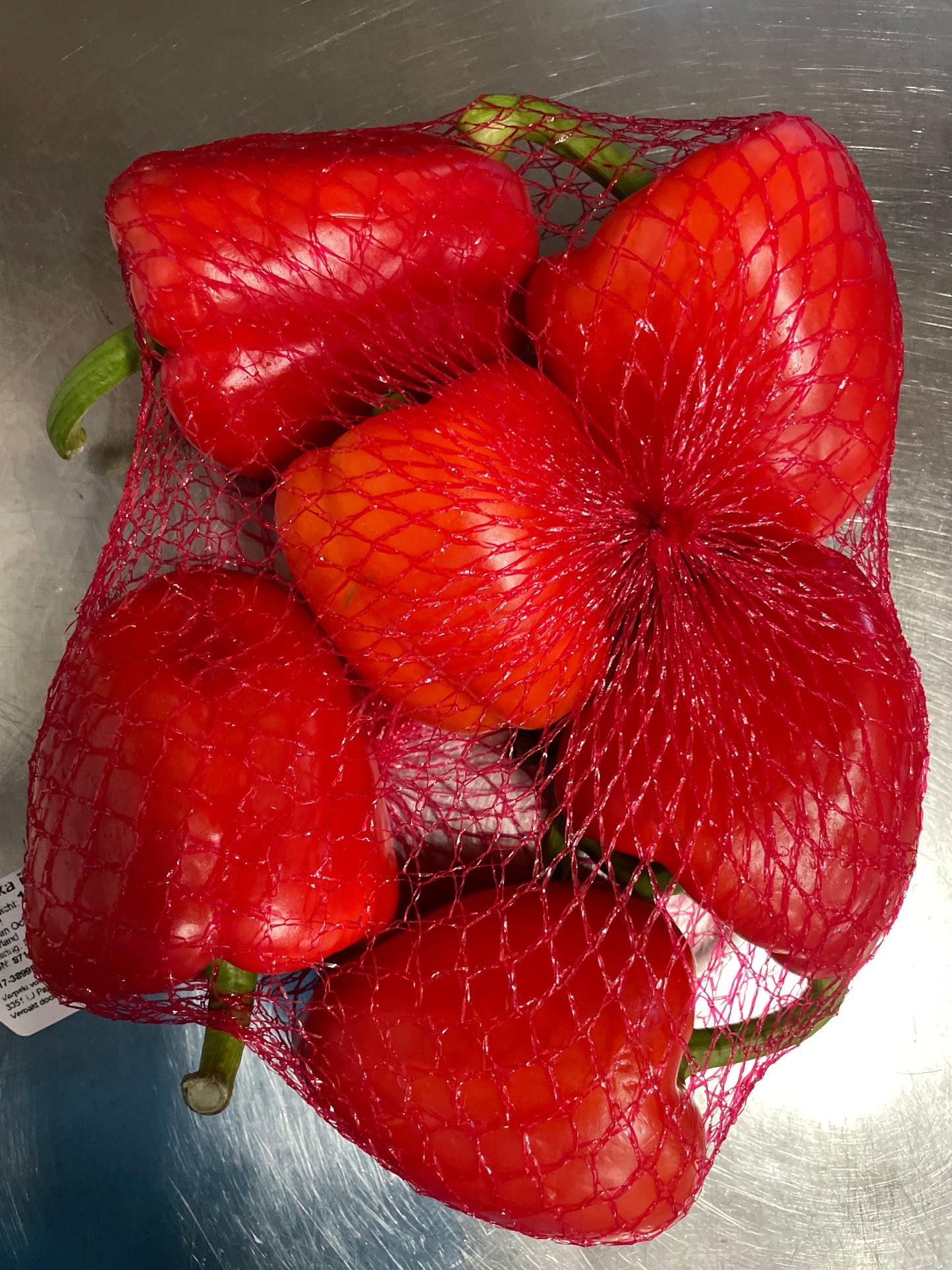 Paprika, rood, ca. 1kg ,6 st per netje