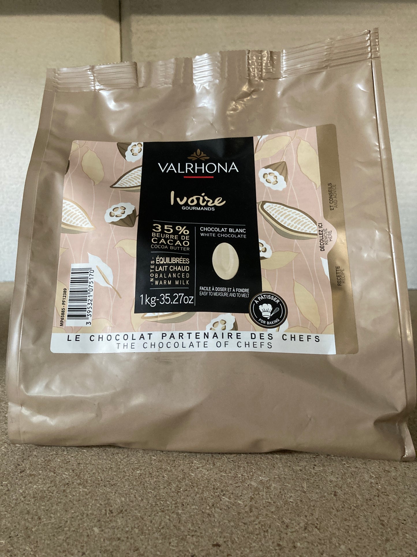 K40P03 witte chocolade 1kg (waarschijnlijk gesmolten)